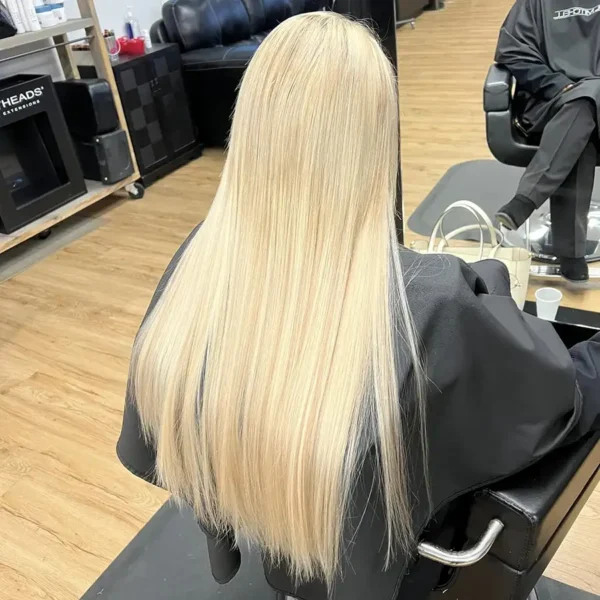 The Experience Hair Studio - bright blond hair extensions, straightened style - Edwardsville, IL